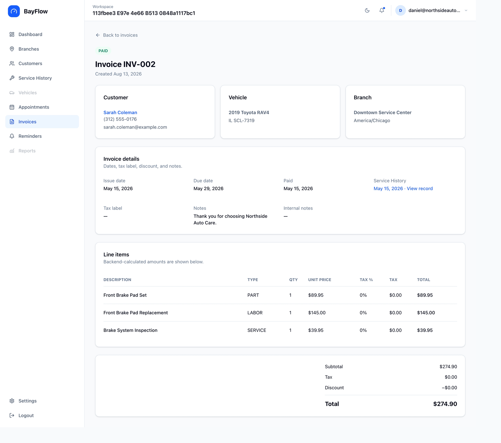BayFlow paid invoice screen showing customer, vehicle, location, and service line-item details